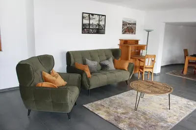 Ein Sitzbereich in der Unterkunft Ferienwohnung Flussufer No.12