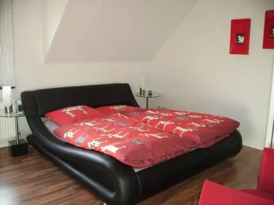 Ein Bett oder Betten in einem Zimmer der Unterkunft Ambiente
