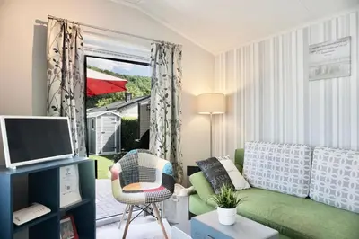 TV/Unterhaltungsangebot in der Unterkunft Ferienhaus Ufergeheimnis am Gülser Moselbogen I 2 SZ I 5 Gäste I Badebucht I Grill I Garten