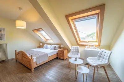 Ein Bett oder Betten in einem Zimmer der Unterkunft Gästehaus Mack - Mosel Rooms & Restaurant