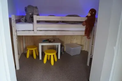 Ein Etagenbett oder Etagenbetten in einem Zimmer der Unterkunft Ferienwohnung Weingarten