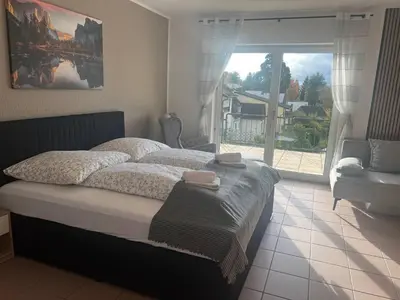 Ein Bett oder Betten in einem Zimmer der Unterkunft Rheinview Urbar Haus