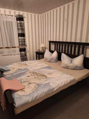 Ein Bett oder Betten in einem Zimmer der Unterkunft Haus Rosi