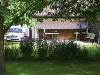 Ein Garten an der Unterkunft Eifelferienhaus Thome
