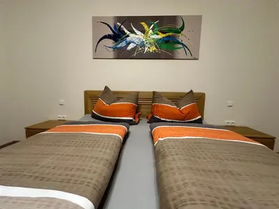 Ein Bett oder Betten in einem Zimmer der Unterkunft Ferienwohnung Korneli