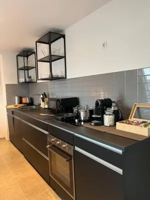Küche/Küchenzeile in der Unterkunft Urban Charm Design Loft