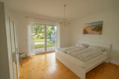 Ein Bett oder Betten in einem Zimmer der Unterkunft Ferienhaus Zum Feldblick