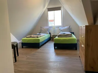 Ein Bett oder Betten in einem Zimmer der Unterkunft Cochemer Arkaden