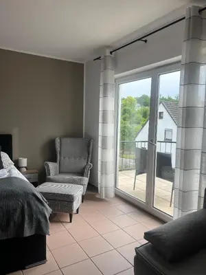 Ein Sitzbereich in der Unterkunft Rheinview Sunset Apartment Urbar