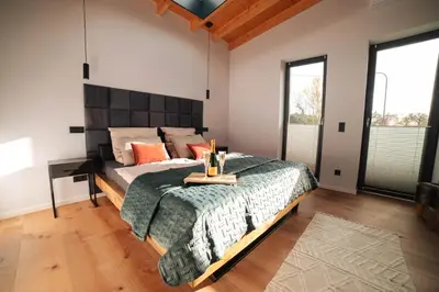 Ein Bett oder Betten in einem Zimmer der Unterkunft Relax Lodge (Eifel)