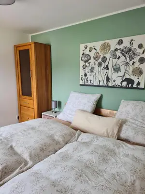 Ein Bett oder Betten in einem Zimmer der Unterkunft Ferienwohnung Burgblick