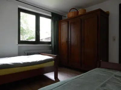 Ein Bett oder Betten in einem Zimmer der Unterkunft Haus am Wald