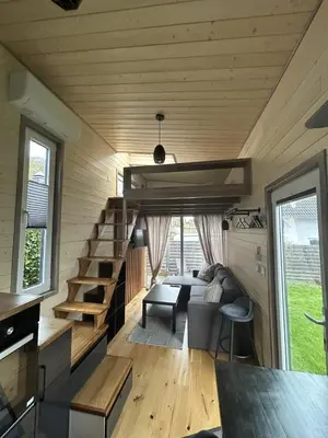 Ein Sitzbereich in der Unterkunft Tiny House