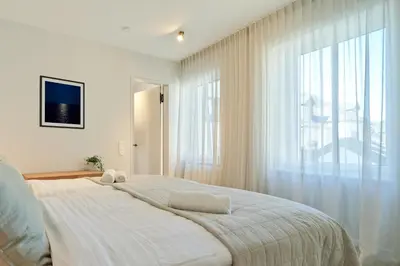 Ein Bett oder Betten in einem Zimmer der Unterkunft High-End einmaliges Townhouse - bis 6 Personen - Wittlich - Top Lage im Zentrum - Marvin Jeske Retreats