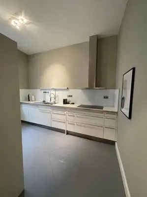 Küche/Küchenzeile in der Unterkunft BG Living & Hosting - Exklusive Jugendstilwohnung an der Mosel in Ürzig - 2 Schlafzimmer, bis 4 Personen, Fahrradkeller, Waschmaschine & Trockner