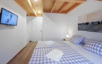 Ein Bett oder Betten in einem Zimmer der Unterkunft Ferienpark Wolfsschlucht