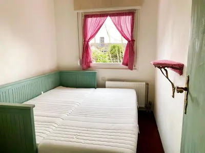 Ein Bett oder Betten in einem Zimmer der Unterkunft Haus am See mit fantastischem Blick