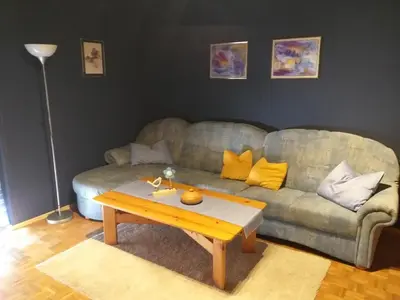 Ein Sitzbereich in der Unterkunft Apartment Zwei Schlafzimmer- Betten in Komforthöhe