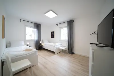 Ein Bett oder Betten in einem Zimmer der Unterkunft DWK: Monteurhaus Braubach bei Koblenz
