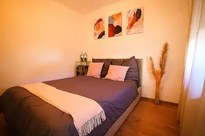 Ein Bett oder Betten in einem Zimmer der Unterkunft Moselzauber Güls