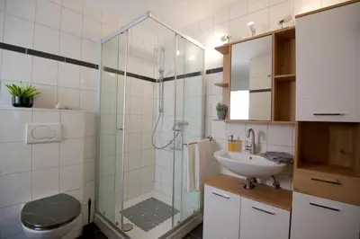 Ein Badezimmer in der Unterkunft FEWO Moseleule