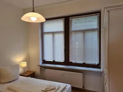 Ein Bett oder Betten in einem Zimmer der Unterkunft Moselpromenade 5