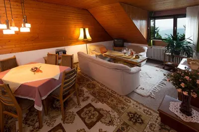 Ein Sitzbereich in der Unterkunft Ferienwohnungen Casa Ri(e)sig