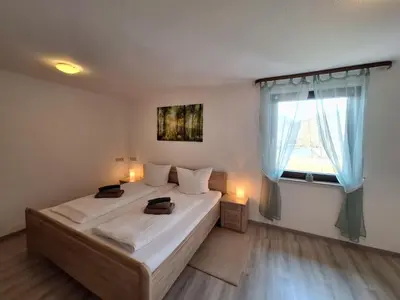 Ein Bett oder Betten in einem Zimmer der Unterkunft Hotel | Restaurant | Forellenzucht