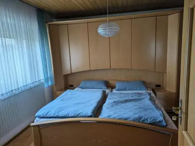 Ein Bett oder Betten in einem Zimmer der Unterkunft Ferienhaus Brigitte