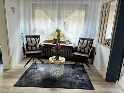 Ein Sitzbereich in der Unterkunft 2 Zimmer Ferienwohnung Denis 2