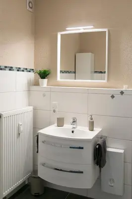 Ein Badezimmer in der Unterkunft I Innenstadt I King-Size-Bett I