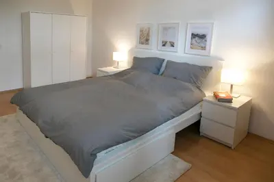 Ein Bett oder Betten in einem Zimmer der Unterkunft I Innenstadt I King-Size-Bett I