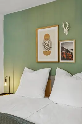 Ein Bett oder Betten in einem Zimmer der Unterkunft DDHomes LahnLiebe App 01 - Balkon,Therme,SmartTV