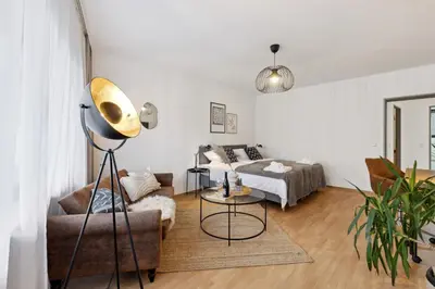 Ein Bett oder Betten in einem Zimmer der Unterkunft DDHomes LahnLiebe App 01 - Balkon,Therme,SmartTV