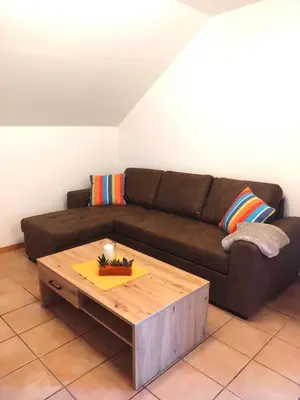 Ein Sitzbereich in der Unterkunft Ferienwohnung Veldenz