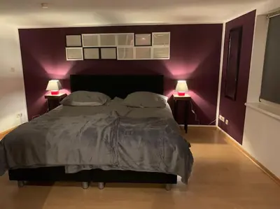 Ein Bett oder Betten in einem Zimmer der Unterkunft Am Zwingelbrunnen in der Altstadt