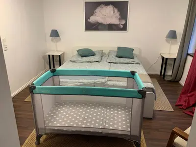 Ein Bett oder Betten in einem Zimmer der Unterkunft Fischerhaus in der Altstadt