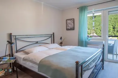 Ein Bett oder Betten in einem Zimmer der Unterkunft Zum Moselsteig