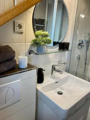 Ein Badezimmer in der Unterkunft Fewo-zum-Nussbaum - Mosel 2