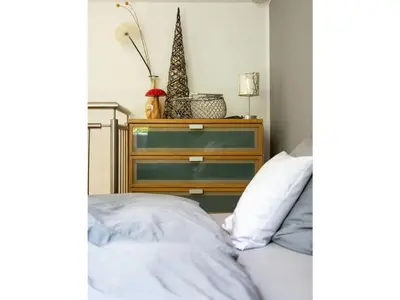 Ein Bett oder Betten in einem Zimmer der Unterkunft Romantic apartment with balcony