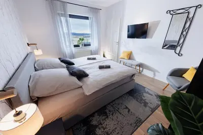 Ein Bett oder Betten in einem Zimmer der Unterkunft Racing-Apartment (Ferienwohnung)