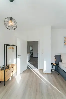 Ein Bett oder Betten in einem Zimmer der Unterkunft Deluxe Studio, PS4, Parken, Netflix, Klinikum