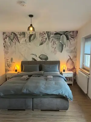 Ein Bett oder Betten in einem Zimmer der Unterkunft Ferienwohnung Clemens