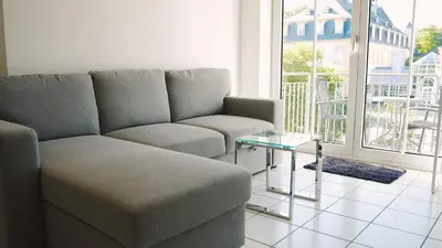 Ein Sitzbereich in der Unterkunft Apartment mit Balkon, Küche & Waschmaschine an der WHU