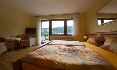 Ein Bett oder Betten in einem Zimmer der Unterkunft Weingut Gerhard Trossen