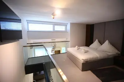 Ein Bett oder Betten in einem Zimmer der Unterkunft JAM Apartments