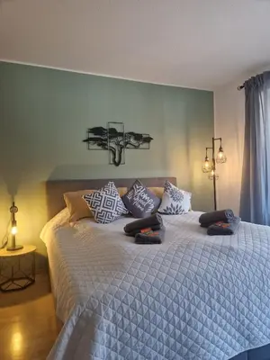 Ein Bett oder Betten in einem Zimmer der Unterkunft DEHOME - Enjoy - Stay by Central Station