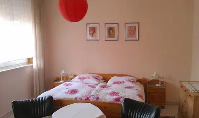 Ein Bett oder Betten in einem Zimmer der Unterkunft Ferienwohnung Haus Wehrbüsch