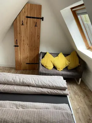 Ein Bett oder Betten in einem Zimmer der Unterkunft Fachwerkhaus Kürbis Bacharach