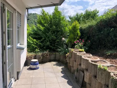Ein Garten an der Unterkunft Unter den Weinbergen